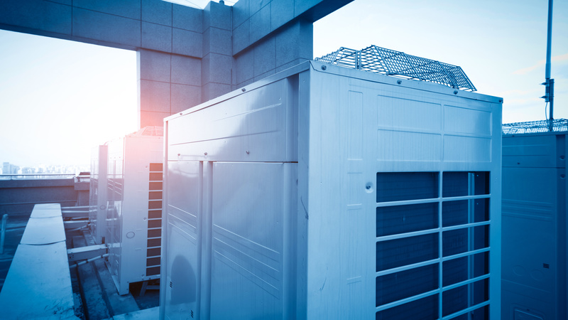 Air conditioning system assembled on top of a building.